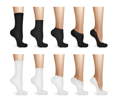 Female Legs In White And Black Socks