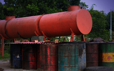 Fototapeta na wymiar oil barrels or tanks on materials 