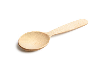 Empty wooden spoon in beige color isolated on a white background. New ecological cutlery made of natural material.