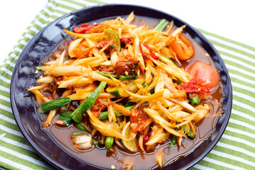 Spicy papaya salad with pickled shells