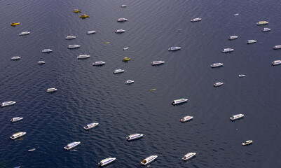 Lots of boats aligned in the same direction on the Lake Titicaca, Bolivia. The alignment is...