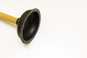 Vantus with a wooden handle lies on a white background