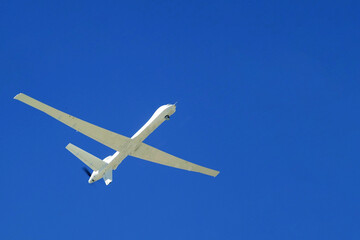 UAV in a cloudless sky. Elements of this image furnished by NASA