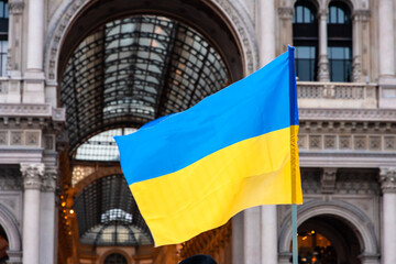 Ukrainian flag waved in Duomo Square in a protest against Russia invasion, Milan