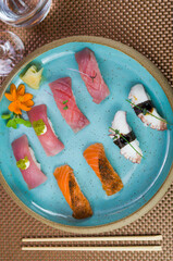 Assorted premium tuna and salmon nigiri sushi.