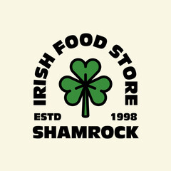 Shamrock badge logo. Irish clover emblem vector design. Saint Patrick's Day. Isolated retro logo