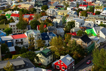 A partial, high-angle view of the colorful buildings of downtown Reykjavík, Iceland - obrazy, fototapety, plakaty