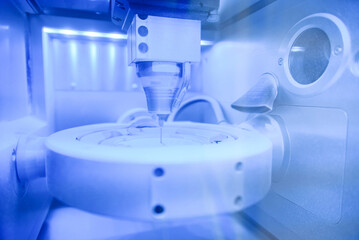 Cad cam milling machine in dental laboratory. Production of high esthetic dental crowns and...