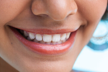 Closeup of a young Hispanic woman smiling