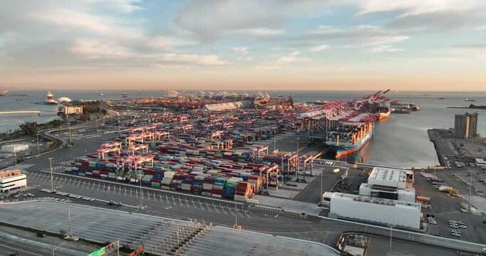 Aerial view of shipping containers and cargo ready for export and import at sea port
