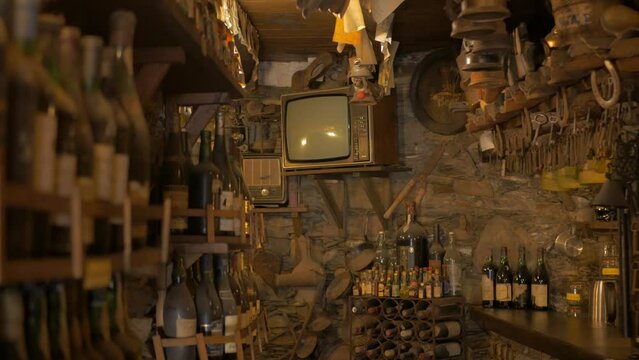 Inside an old traditional bar in a schist stone village named Talasnal, localed in Portugal.
Traditional old furniture and objects