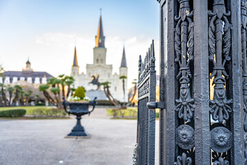 Close up of the antique, historical iron gate at the entrance to Jackson Square in New Orleans.
