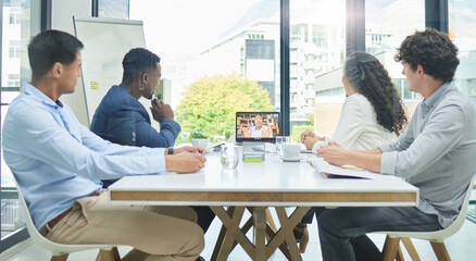 Thank you for joining us. Shot of a team of staff having a virtual meeting using a laptop.