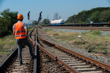 person on railroad tracks. person on railways tracks