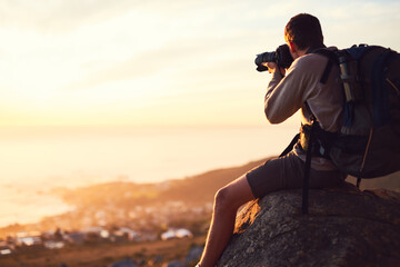 Hike more, worry less. Shot of a young photographer taking a picture from the top of a mountain. - obrazy, fototapety, plakaty