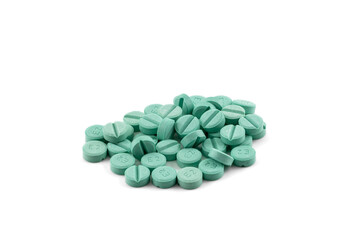 Fototapeta na wymiar green pills isolated on white background