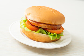 chicken burger with sauce on plate