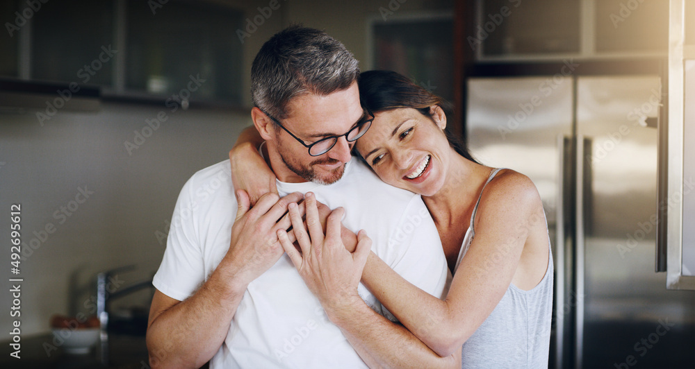 Sticker Our love could last many lifetimes. Shot of a mature couple spending quality time together in the morning at home.