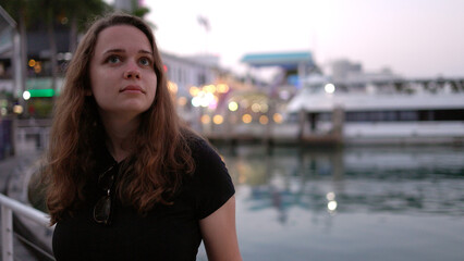 Young woman at Miami Bayside - close up shot in the evening