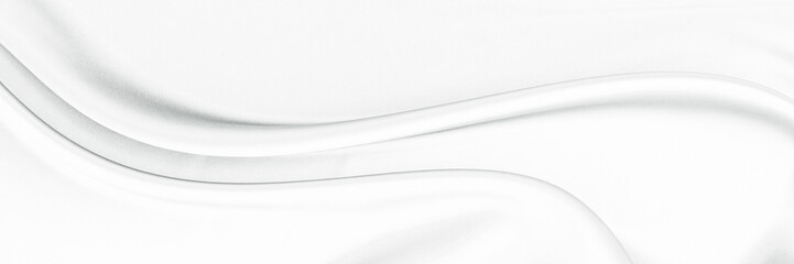 White gray satin texture that is white silver fabric silk background with beautiful soft blur...