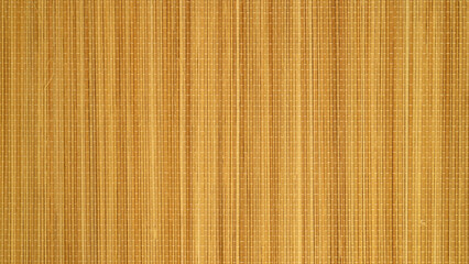 woven texture of light brown sticks with a vertical arrangement