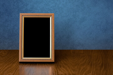 frame on table, blue wall