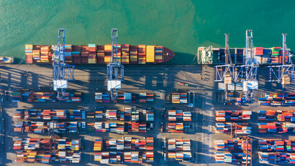 Container ship at industrial port import export global business worldwide logistic transportation...