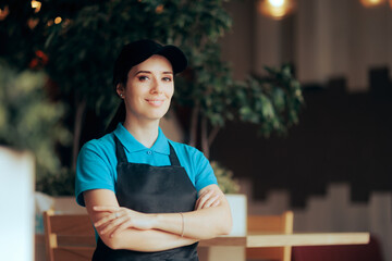 Happy Restaurant Waitress Smiling Standing with Arms Crossed