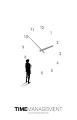 Silhouette of businessman standing with clock. Concept for office employee and working time.