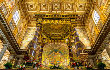 Fototapeta na wymiar Apse and presbytery ceiling polychromic painting of papal basilica of Saint Mary Major, Basilica di Santa Maria Maggiore, in historic city center of Rome in Italy