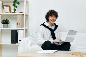 man laptop sitting on white sofa online training Lifestyle technology