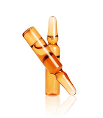 Two cosmetic or medical ampoules closeup isolated on a white background