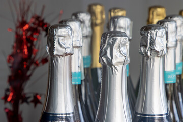 Naklejka na ściany i meble Unopened champagne bottles before a party
