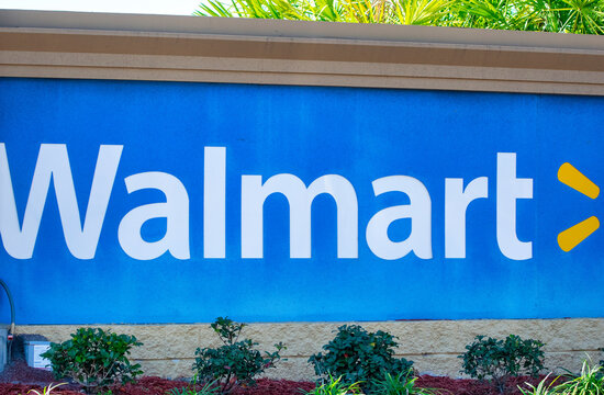Daytona Beach, Florida - February 17, 2016: Walmart entrance sign. Walmart is an American multinational retail corporation that operates a chain of hypermarkets.