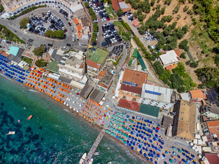 Overhead aerial view of Marina del Cantone Beach on a sunny day, Amalfi Coast - Italy. Beach...