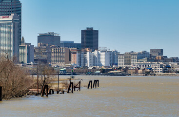 New Orleans, Louisiana - February 11, 2016: City skyline from Mississippi River on a sunny winter...