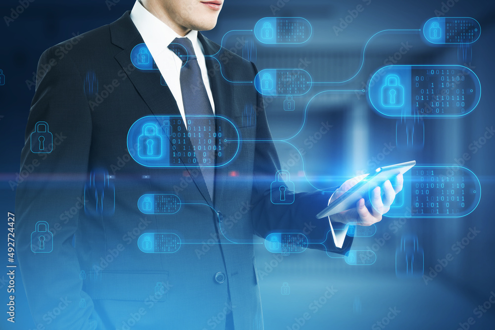 Aufkleber Close up of male hand holding tablet with abstract big data and security nodes hologram on blurry background. Technology, web safety and programming concept. Double exposure.