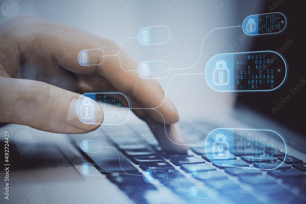 Leinwandbilder Close up of male hands using laptop computer with abstract big data and security nodes on blurry background. Technology, web safety and programming concept. Double exposure.