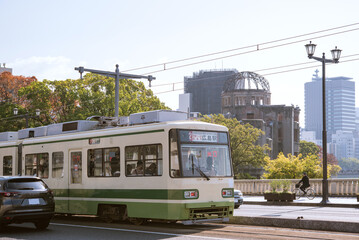 Atomic Bomb Dome and streetcar (tram) in Hiroshima,...
