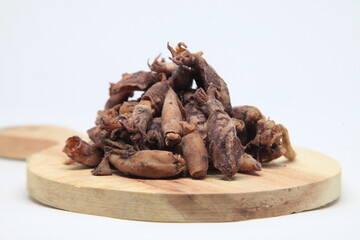 Dried squids on a wooden tray