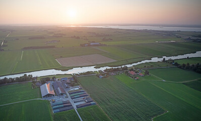 Agricultural landscape of Friesland, one of the northern provinces of the Netherlands - Friesland...