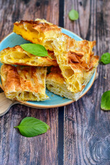 Fresh baked home made  Cheese Puff pastries.Cheese pie with phyllo pastry and  white cheese.