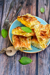 Fresh baked home made  Cheese Puff pastries.Cheese pie with phyllo pastry and  white cheese.