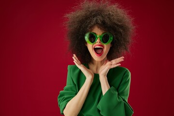 pretty woman posing emotion gesture hands red background