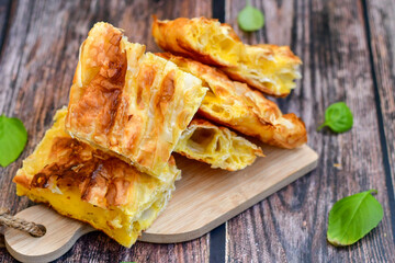 Fresh baked home made  Cheese Puff pastries.Cheese pie with phyllo pastry and  white cheese.
