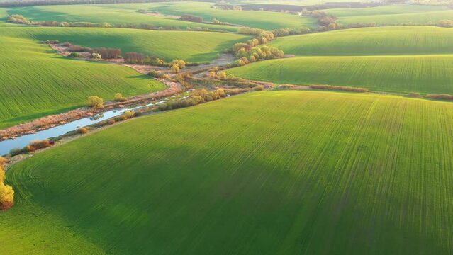 Gorgeous aerial footage of a rolling hills of agricultural area. Filmed in UHD 4k, drone video.