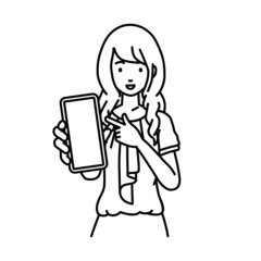 立ってスマートフォンを指差してこちらに向けて見せているオフィスカジュアルの女性