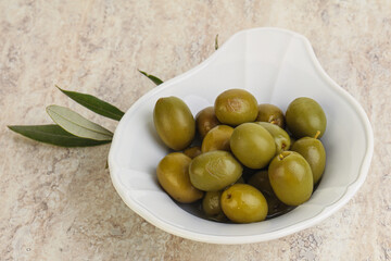 Tasty marinated olives in the bowl