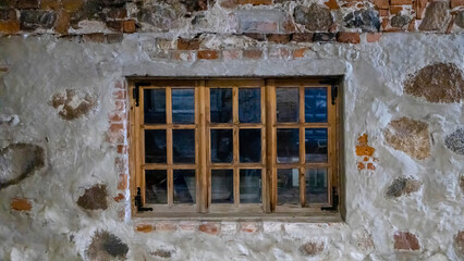 Window built into the old stone wall