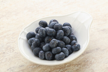 Sweet ripe blueberry heap in the bowl